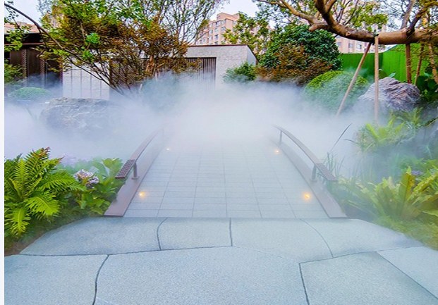 Scenic garden bridge with fog over the walkway