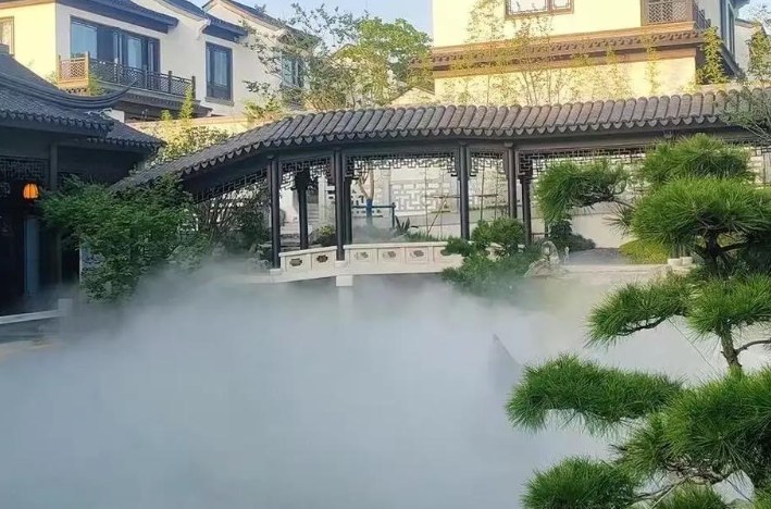 Courtyard landscape fog around planting and stone features